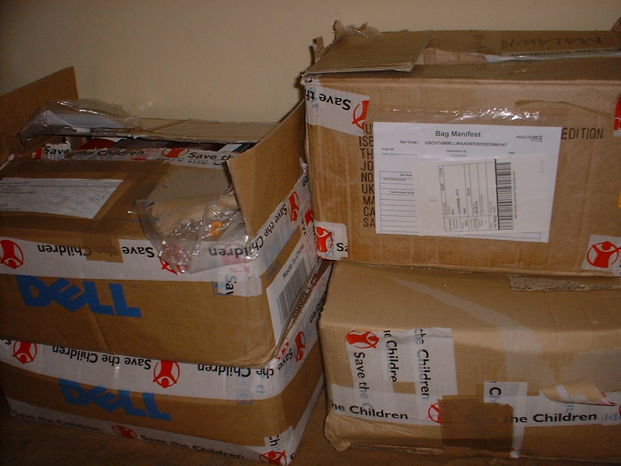 cartons of book donations from Save the Children UK